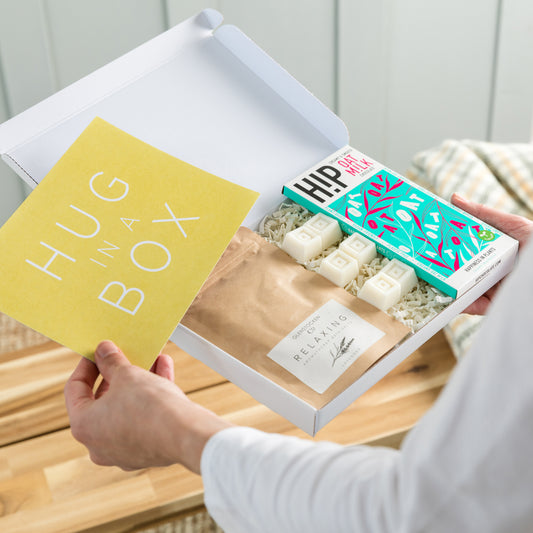 Happy Letterbox Gift Co. | Vegan Hug in a Box. Our vegan firendly hug in a box gift box contains HIP vegan chocolate, plant wax melts in bergamot and Lemongrass and our relaxing Epsom bath salts in Lavender, all in a letterbox friendly gift box.